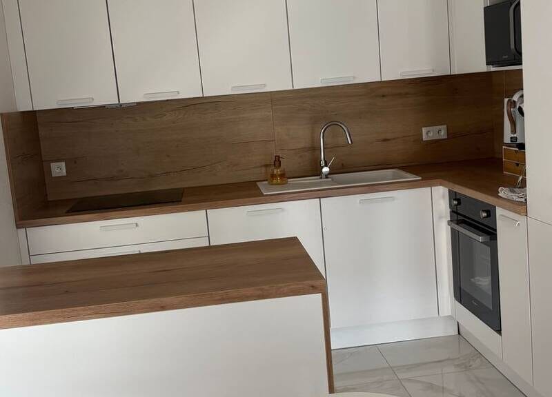 Bel appartement lumineux avec garage et balcon en centre-ville