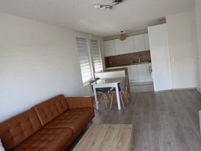 Bel appartement lumineux avec garage et balcon en centre-ville