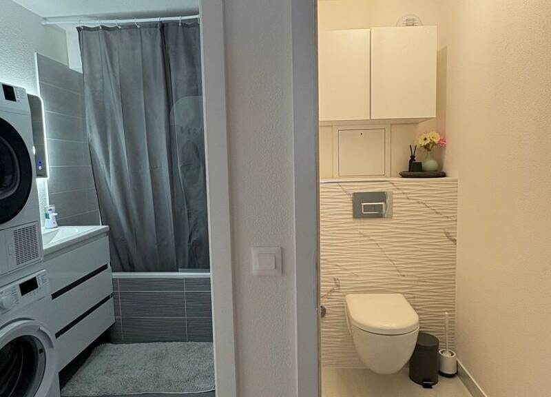 Bel appartement lumineux avec garage et balcon en centre-ville