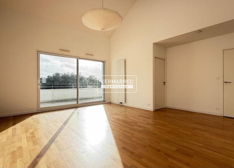 Appartement spacieux avec balcon et garage à [Localisation]